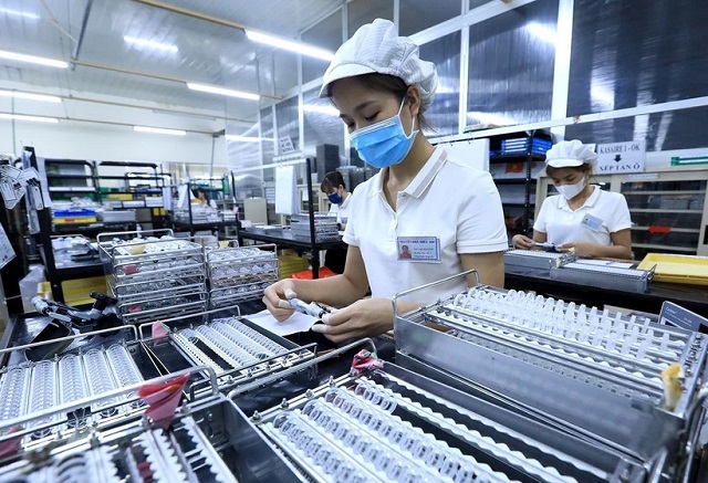 Kinh tế Việt Nam đi ngược lại với xu hướng suy giảm trên toàn thế giới 1 kinh te viet nam qua goc nhin cua bao chi quoc te